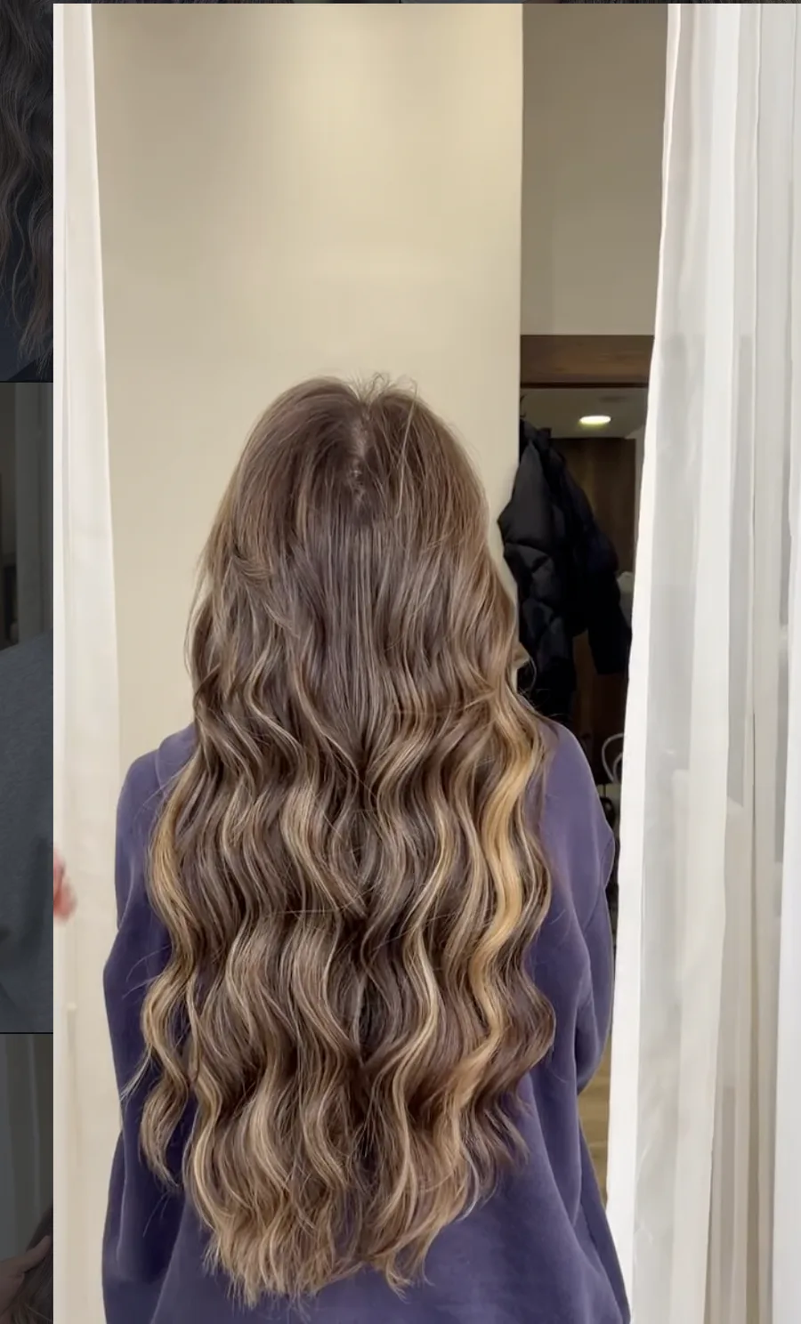 Balayage blond sur cheveux très longs ondulés